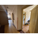 original_1792257672_run-down-apartment-hallway-under-renovation.png
