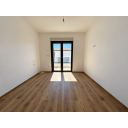 original_1791188710_sunlit-minimalist-room-with-balcony-doors.png