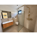 original_1792006880_minimalist-beige-bathroom-with-brass-fixtures.png