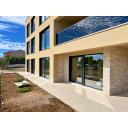 original_1792006909_modern-beige-home-with-glass-balcony.png