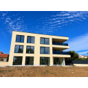 original_1792006947_modern-beige-apartment-under-blue-skies.png