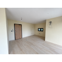 original_1792007266_empty-beige-apartment-interior-with-exposed-wiring.png