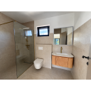 original_1792007285_minimalist-beige-bathroom-with-brass-fixtures-1.png