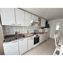 original_1791203954_modern-white-kitchen-and-dining-area.png
