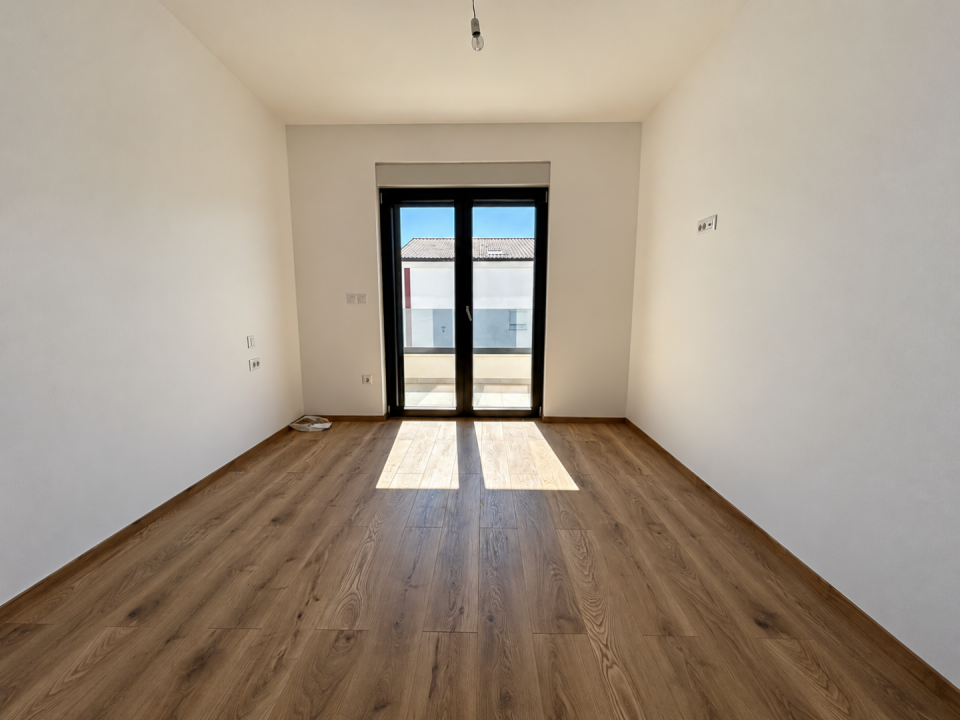 original_1791188710_sunlit-minimalist-room-with-balcony-doors.png