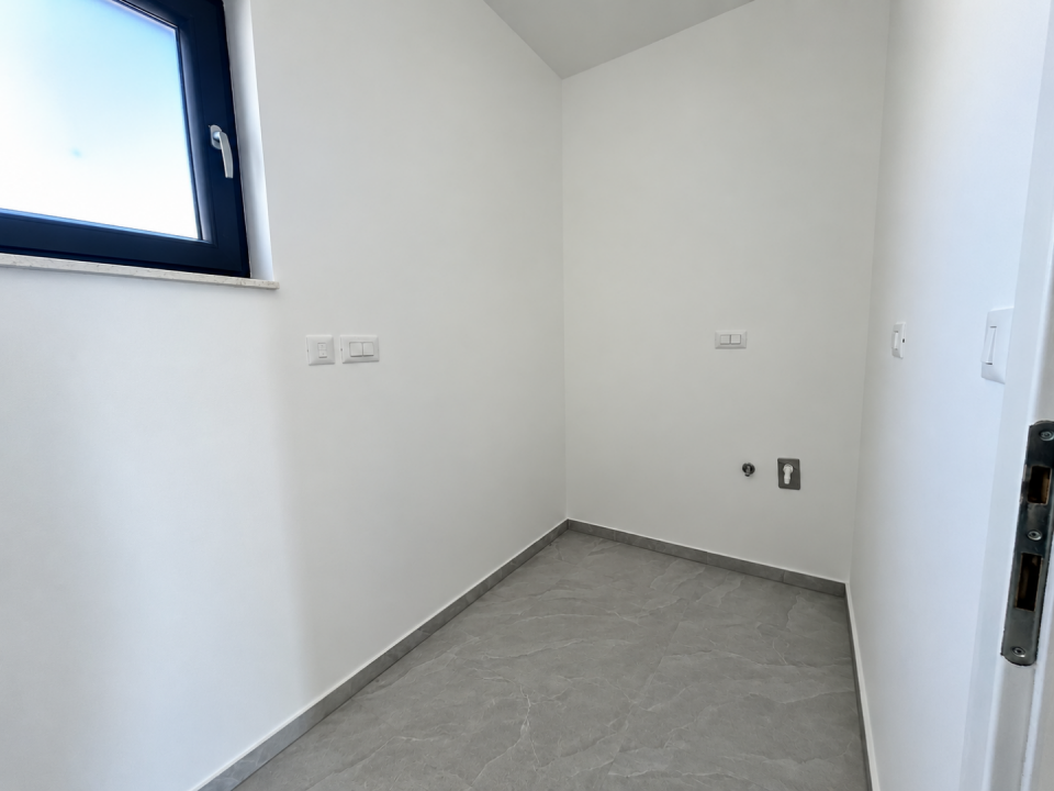 original_1791192999_minimal-utility-room-with-window-and-hookups.png