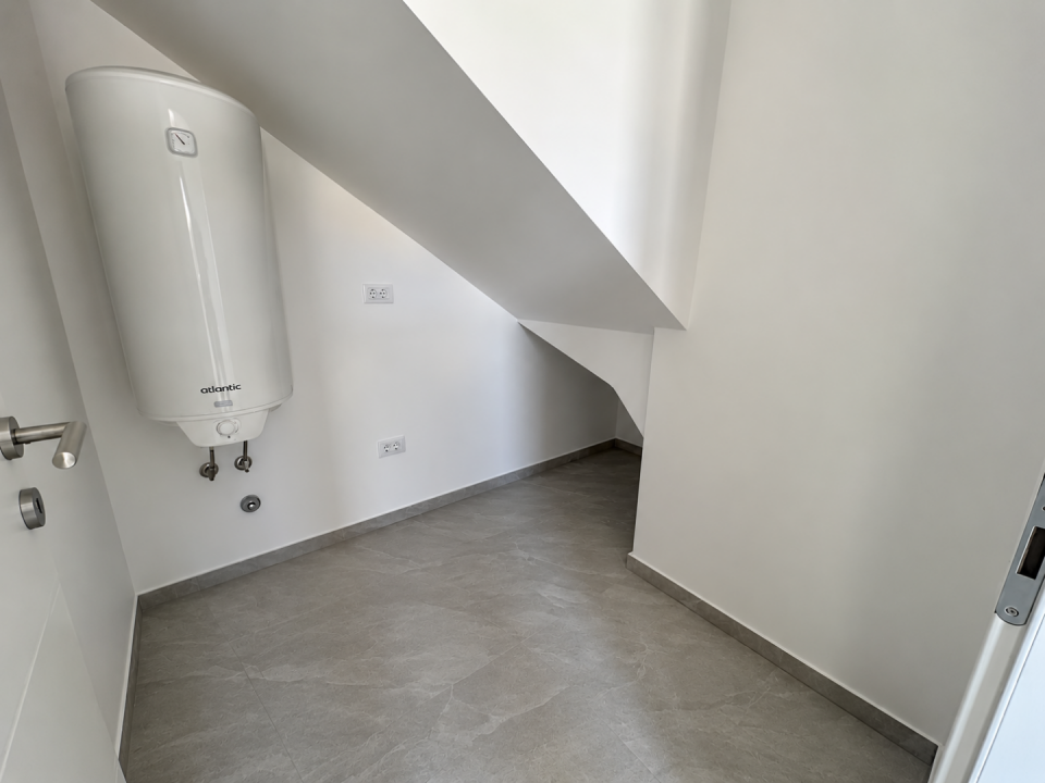 original_1791193035_minimalist-utility-room-with-water-heater.png