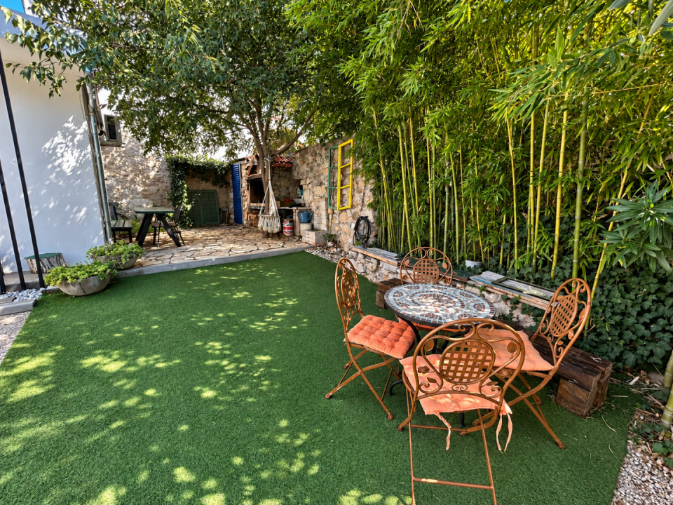 original_1790929369_sunlit-mediterranean-garden-patio.png