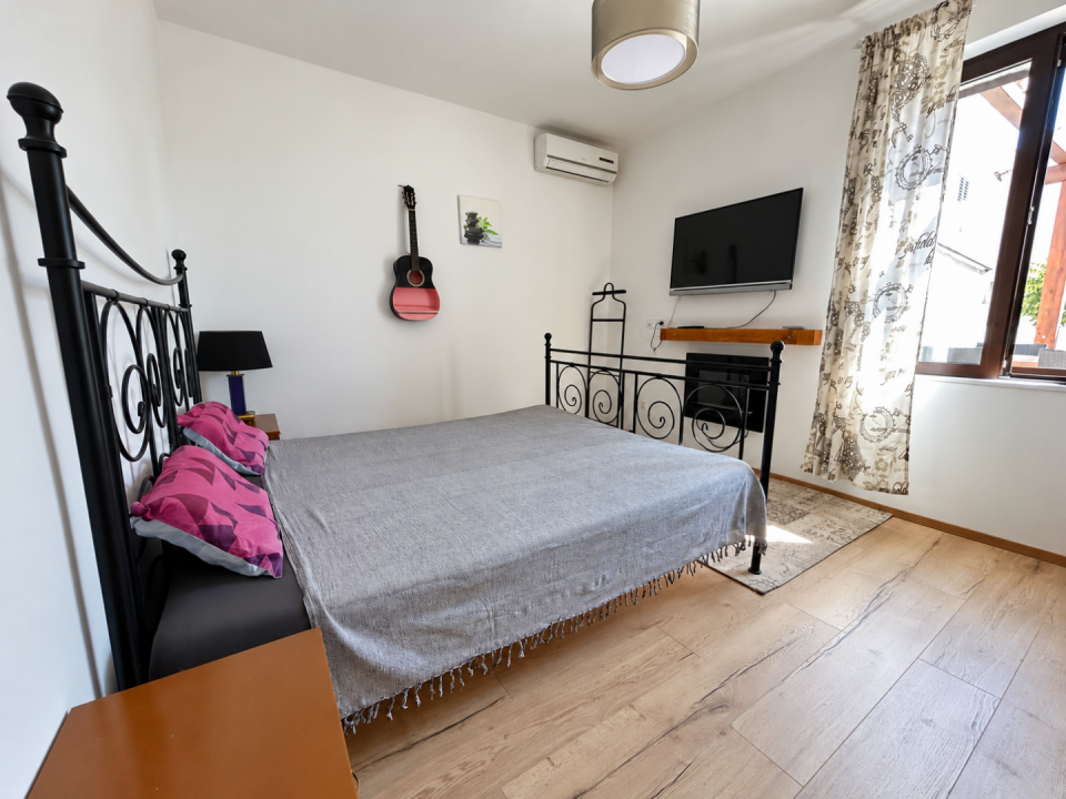 original_1790929456_crisp-minimalist-bedroom-with-guitar-and-window.png