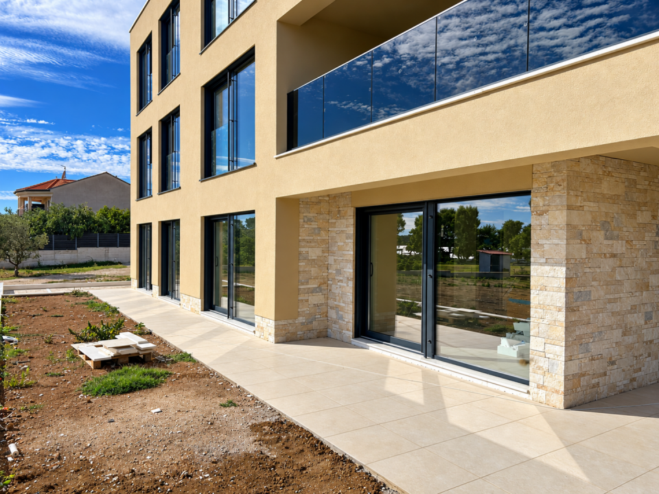 original_1792006909_modern-beige-home-with-glass-balcony.png